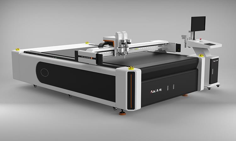 Composite material cutting machine